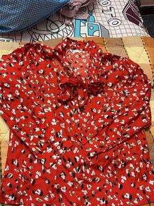 Chic Red Abstract Print Blouse with Bow
