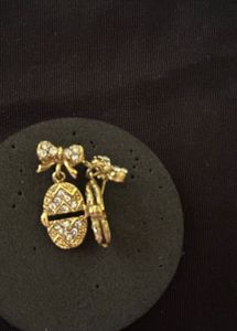 Gold Tone Bow Egg Dangle Earrings