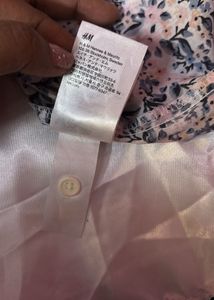 Chic Sleeveless Floral Button-Up Top