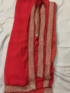 Elegant Red Saree with Embellished Border