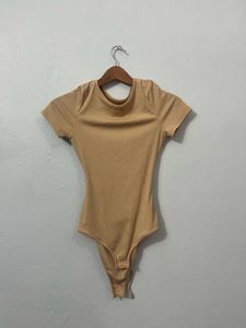 Urbanic Backless Bodysuit Tie Up Detail