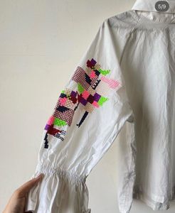 White Embroidered Blouse with Ruffled Cuffs