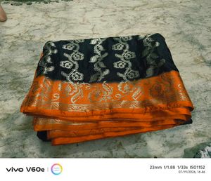 Elegant Black Saree with Floral Border
