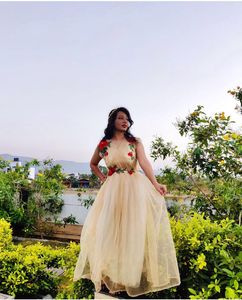 Elegant Princess gold Gown with Red Roses