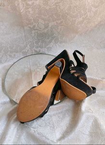 bow platform heels and  black high heel