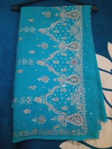 Elegant Turquoise Embroidered Saree