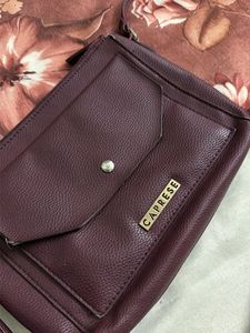 Caprese Burgundy leather sling bag