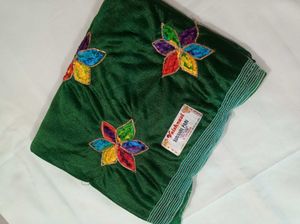 Elegant Green Saree with Floral Embroidery