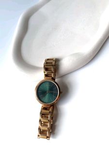 Elegant Gold Watch with Green Dial