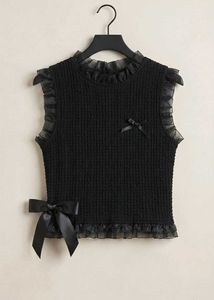 Chic Black Smocked Top with Bow Accent