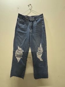 Distressed Blue Denim Jeans