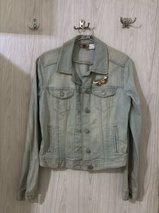 Light Wash Denim Jacket with Butterfly Brooch