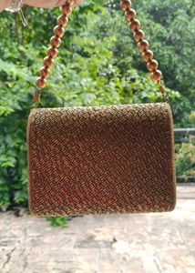 Elegant Beaded Clutch with Gold Chain