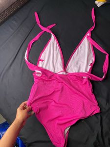 pink bodysuit
