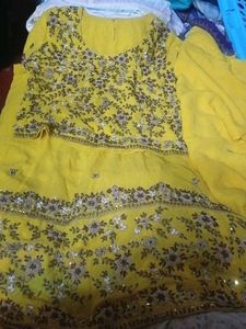 Stunning Yellow Embroidered Lehenga Choli