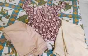 Maroon Floral short Kurta with cream Trousers