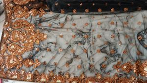 Net Black Saree With Golden Work
