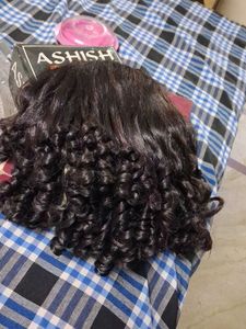Curly Dark Brown hairs