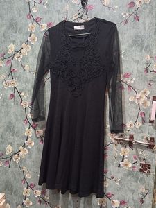 Elegant Black Dress with Lace Detail