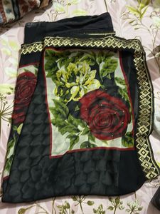 Elegant Black Saree with Gold Border