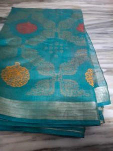 Beautiful Teal Saree with Golden Motifs