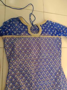 Elegant Blue Kurta with Intricate Gold Embellishme