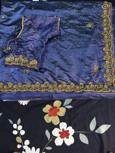 Royal Blue Embroidered Silk Saree.           some