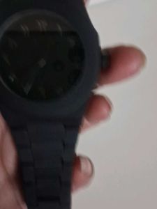 Sleek Black Watch with Unique Dial