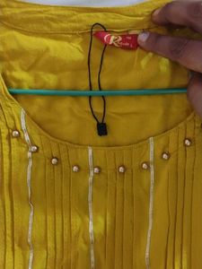 Stylish Yellow Kurta with Embellishments