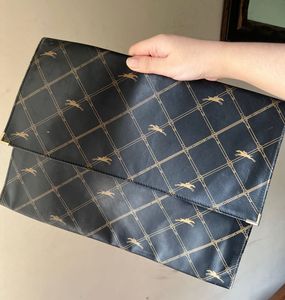 vintage Longchamp Monogram clutch