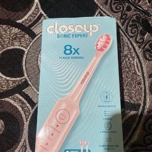 Closeup Sonic Expert Electric Toothbrush