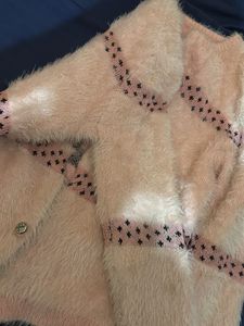 Pink Fuzzy Cardigan with Star Detail