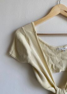 butter yellow cutout bodycon with a twist knot