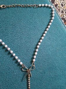 Elegant Pearl & Bow Necklace