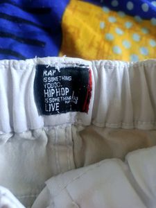 Black Shirt; White Pant And Velvet Type Pan