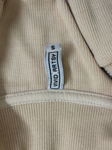 Sleeveless Mock Neck Zip Top