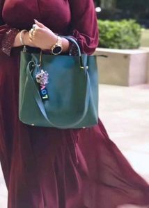 Stylish Teal Handbag with Charm
