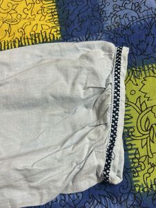 Embroidered Light Blue Peplum Top