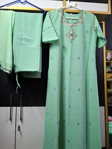 Elegant Mint Green Kurta Set with Intricate Embroi