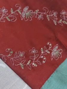 A dual-tone Embroidered Silk Cushion Cover
