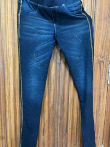 Stylish Dark Wash Jeans with Gold Stripe