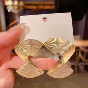 Unique Gold Swirl Fan Earrings