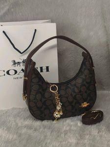 Coach Moon coffee brown with charm 🤎