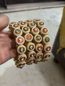 Exquisite Kundan & Pearl metal bangals