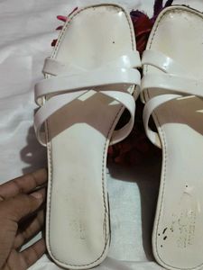 White patent criss-cross flats