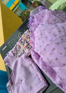 Lavender saree with stiched blouse