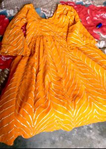 Vibrant Orange Kurta with Golden Chevron Print