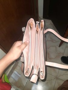 Stylish Pink Handbag with Multiple Compartments