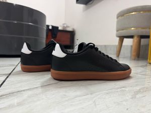 Adidas Black Gum Sole Sneakers