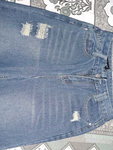 Distressed Wide Leg Denim Jeans
